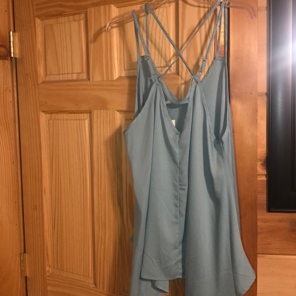 Women’s teal blue top